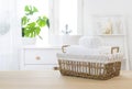 Towels in wicker basket on table with bathroom windowsill background Royalty Free Stock Photo