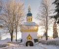 Tower above the entrance to Holy Dormition Pskovo Pechersky Male Monastery in the town of Pechora, Pskov Region, Russia, on a