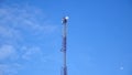 Tower antennas, GSM mobile communication against the blue sky with the moon Royalty Free Stock Photo