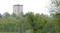 Tower Block rising from the forest 3