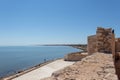 Tower of the Borj el Kebir Castle with background of Mediterranean sea in Houmt El Souk in Djerba, Tunisia Royalty Free Stock Photo