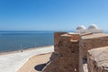 Tower of the Borj el Kebir Castle with background of Mediterranean sea in Houmt El Souk in Djerba, Tunisia Royalty Free Stock Photo