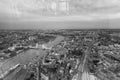 Tower Bridge and city skyline along river Thames at night, aerial view - London - UK Royalty Free Stock Photo