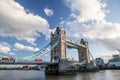 Tower Bridge. Famous London landmark. Red bus crossing the Thames