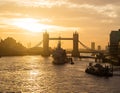 Tower Bridge and HMS Belfast in London at sunrise Royalty Free Stock Photo