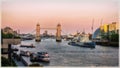 The Tower bridge and HMS Belfast in London on sunset