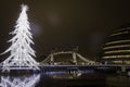 Tower Bridge in London during dusk in December with Christmas Tree Royalty Free Stock Photo