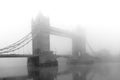 Tower Bridge London in fog in black and white in Great Britain Europe Royalty Free Stock Photo