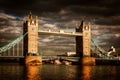 Tower Bridge in London, the UK. Dramatic stormy and rainy clouds