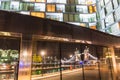 Tower Bridge reflecting in an illuminated facade