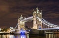 Tower Bridge seen from the docks at night in London, UK Royalty Free Stock Photo