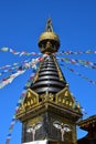 The top of a buddhist temple with Tibetan prayer flags Royalty Free Stock Photo