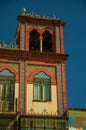 Tower on building with ceramic and bricks details at Merida