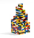 Tower built of colorful plastic building blocks
