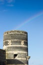 Tower of castle of Angers under rainbow, France