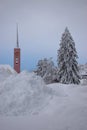 Church behind a heap of snow in Buchs in Switzerland 15.1.2021