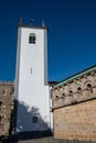 Tower of the church of Nossa Senhora da AssunÃÂ§ao, Domus Municipalis and castle in background.BraganÃÂ§a. Royalty Free Stock Photo