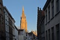 Tower of the church of our Lady in the winter evening sun in Bruges Royalty Free Stock Photo