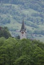 Catholic church behind the forest in Balzers in Liechtenstein 30.4.2020