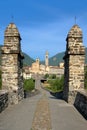 The tower of the church with stone columns in bobbio village in italy
