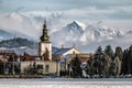 Tower of church in village Liskova, Slovakia. Peak Krivan at background