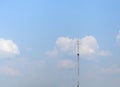 Tower climber and working on cellular tower system. extreme height Royalty Free Stock Photo