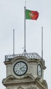 tower with clock and flag of the Portuguese Republic in the Portuguese city of Coimbra Royalty Free Stock Photo