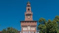 Tower with clock of the Sforza Castle - Castello Sforzesco timelapse, Milan, Italy Royalty Free Stock Photo