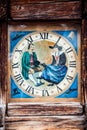 Tower clock in wooden frame with history painting Royalty Free Stock Photo