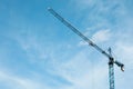 Tower crane against cloudy sky, low angle view Royalty Free Stock Photo