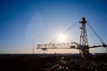 Tower crane against the setting sun Royalty Free Stock Photo