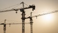 Tower crane at building construction site silhouette Royalty Free Stock Photo