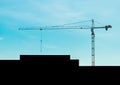 Tower crane in the city on a blue sky background and geometric silhouette of the building on construction site Royalty Free Stock Photo