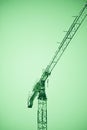 Tower crane in a green background - Green architecture concept image