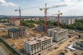 Tower crane on multi-storey housing construction site Royalty Free Stock Photo