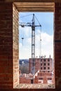 Construction site of a brick high-rise building Royalty Free Stock Photo