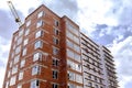 Construction site of a brick high-rise building Royalty Free Stock Photo