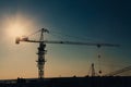 Tower crane silhouette at construction area Royalty Free Stock Photo