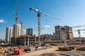Tower cranes and building under construction Royalty Free Stock Photo