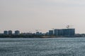 Tower cranes on industrial construction site