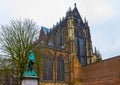 The tower of the Dom cathedral above a row of historical houses of Utrecht, Holland Royalty Free Stock Photo