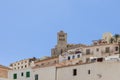 Tower of Eivissa castle in Ibiza rises over old architecture under clear sky Royalty Free Stock Photo