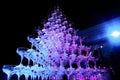 A tower of empty martini glasses with a cherry is on the table. Party at the Club Phaselis Rose Hotel in Kemer, Turkey, a festive Royalty Free Stock Photo