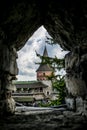 Tower of the fortress through the loophole Royalty Free Stock Photo