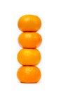 Tower of four tangerine isolated on white Royalty Free Stock Photo