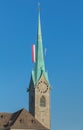 Tower of the Fraumunster, decorated with flags