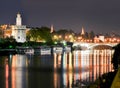 Tower of Gold and Guadalquivir river at night, Seville, Spain Royalty Free Stock Photo