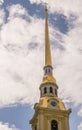 Tower high golden spire and clock Royalty Free Stock Photo