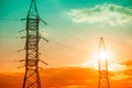 Tower and High Voltage Power Line at sunset.