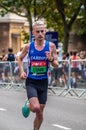 TOWER HILL, LONDON, ENGLAND - 03 October 2021: Josh Lunn running in the Men`s Elite race in the London Marathon 2021 Royalty Free Stock Photo